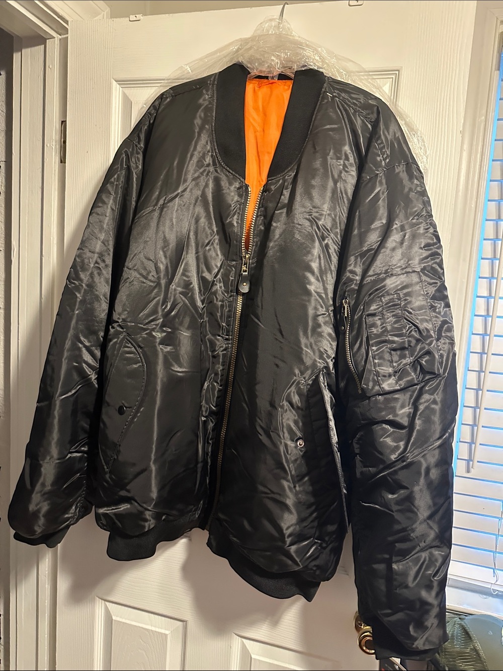 Jordan Craig Black Bomber Jacket with Bright Orange Lining